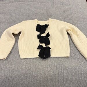 Commense Cream Knit Sweater with Black Bow Accents